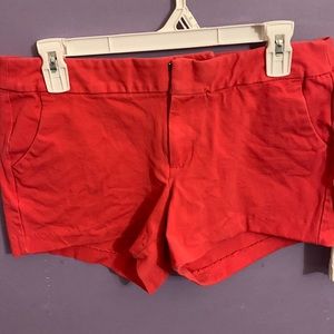 Three pairs of casual dressy women’s shorts.